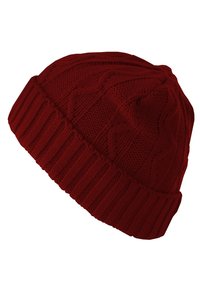 Red knitted beanie hat with a textured cable pattern and a ribbed cuff. Material appears soft and stretchy for comfort and warmth.