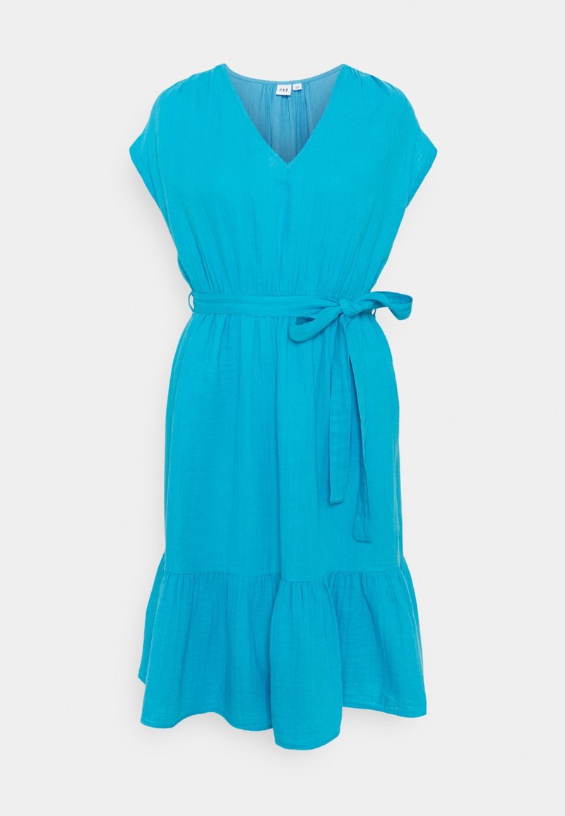 Vedenynsinen, lyhythihainen mekko, jossa on V-pääntie, vyötäröllä vyö ja liehuva röyhelöhelma. Valmistettu kevyestä, teksturoidusta kankaasta.