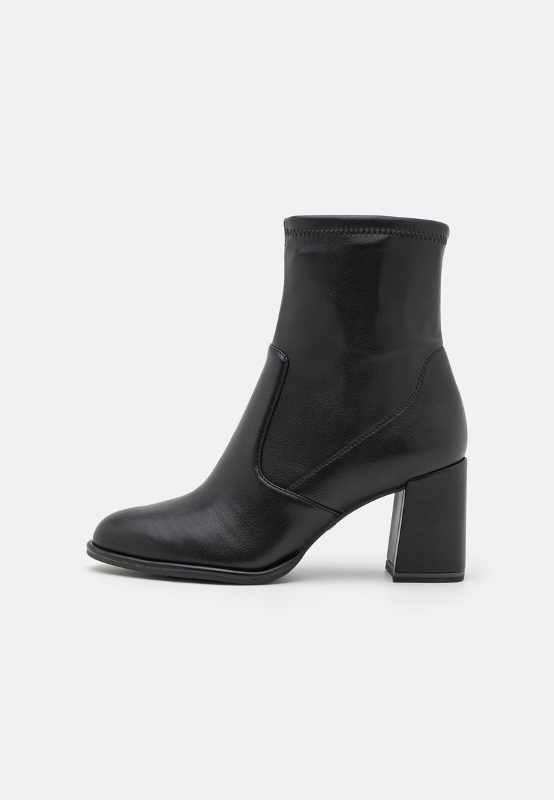 Black ankle boots made of smooth leather, featuring a rounded toe, high block heel, and a stitched top edge, with a sleek silhouette.