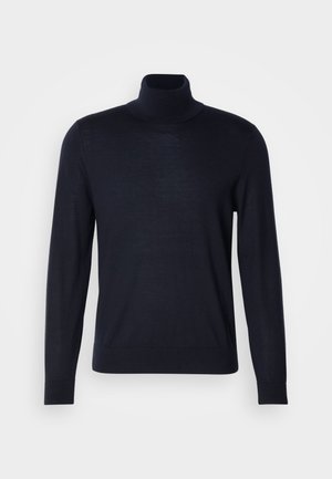 Mørkeblå turtleneck sweater lavet af et fint strikstof, med lange ærmer og en tætsiddende hals. Glat tekstur, ingen mønstre.