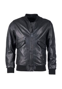 Svart läder bomberjacka med ribbade ärmslut och krage, har två dragkedjefickor på bröstet och en dragkedja framtill.