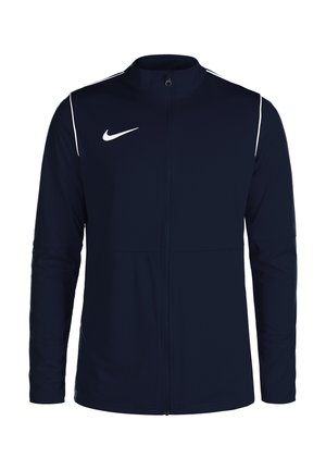 Marineblauwe jas met witte accenten, volledige rits, hoge kraag, lange mouwen en Nike-logo op de borst. Gladde stof, atletische pasvorm, minimalistisch ontwerp.