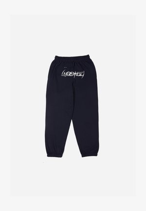 Mornarske trenirke s vezicom u struku, elastičnim manžetama i bijelim "wasted" logotipom sprijeda; izrađene od mekog, rastezljivog materijala.