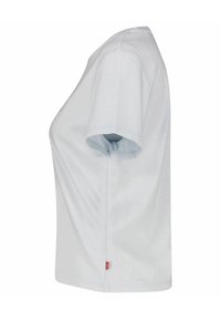 Tričko s krátkým rukávem a klasickým kulatým výstřihem v světle šedé barvě z bavlny, se rovnými lemy a jemnými švy, s malým červeným logem na boku.