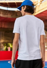 Next REGULAR FIT - EDIT CROPPED FIT - T-shirts print - white