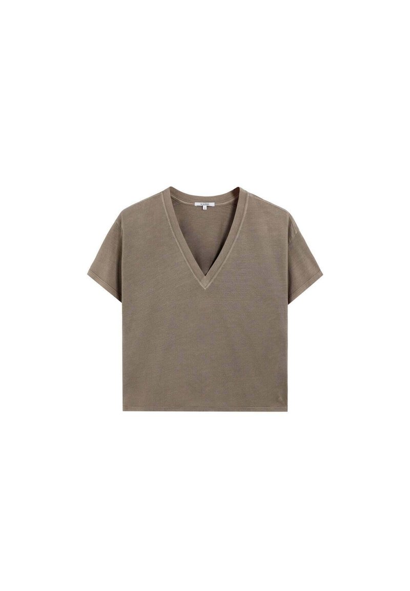 Camiseta verde oliva, cropped, con escote en V y mangas cortas. Fabricada en un tejido suave y ligero, con un ajuste relajado y un diseño minimalista.