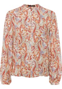 Blusa de manga larga hecha de una tela liviana, con un patrón de paisley multicolor en rojo, azul y amarillo sobre un fondo claro.