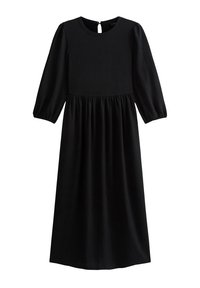 Musta mekko, jossa on pyöreä kaula-aukko, kolmannen osan puffihihat ja rypytetty vyötärö. Valmistettu teksturoidusta kankaasta.