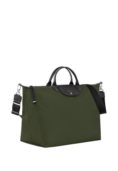 Olive green nylon tote bag with black leather accents, top handles, and detachable strap. Features a smooth texture and minimalistic design.