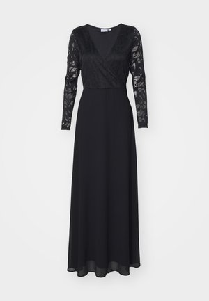 Vestido negro de manga larga con escote en V, cuerpo de encaje y falda fluida. Presenta mangas largas texturizadas y una cintura ajustada.