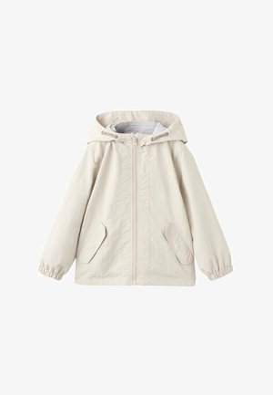 Jachetă cu glugă de culoare bej deschis, realizată dintr-un amestec de bumbac. Are fermoar frontal, manșete elastice și două buzunare frontale. Textură netedă, necăptușită.