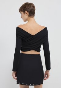Calliope CROISÉ - Langarmshirt - noir