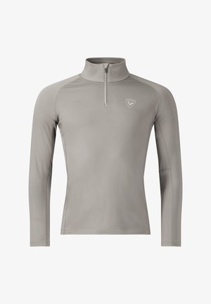 Light gray long-sleeve athletic top with a high collar and quarter zipper, featuring a small logo on the left chest.