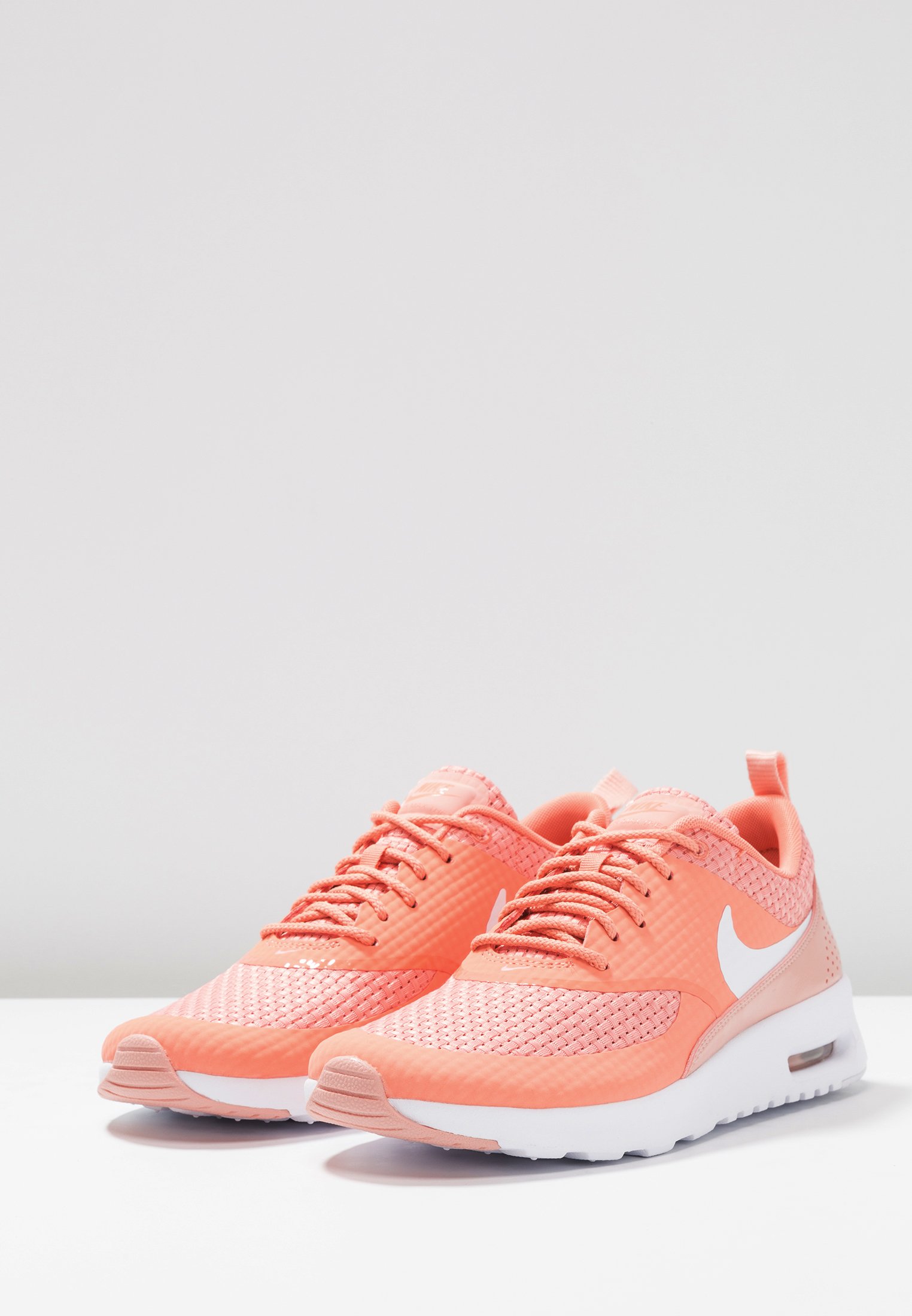 nike thea coral pink