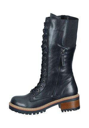 Black leather mid-calf boot with front laces, side zipper, elastic back panel, rugged sole, and stacked wooden heel.