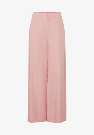 Laia püksid pehme roosa kangaga, millel on sile tekstuur, kõrge talje ja puhas, ilma kaunistusteta disain.