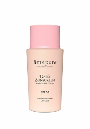 Lys rosa flaske med Âme Pure Daily Sunscreen ansiktskrem med SPF 50, antioksidantkraft og UVA- og UVB-beskyttelse.