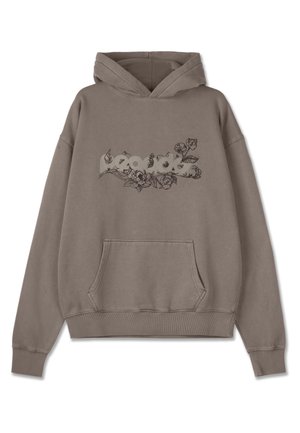 Sudadera marrón con bolsillo frontal, que presenta un diseño floral y un gráfico de texto. Fabricada con un tejido suave, tiene un corte relajado y puños acanalados.