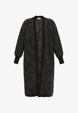 Vapaa-ajan musta neuletakki, jossa on neulottu rakenne. Ominaisuuksia avoin etuosa, ribbaus hihansuissa ja valkoisten ja ruskeiden lankojen kirjailu.