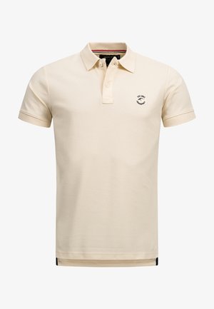 Beige polo skjorte lavet af en bomuldsblanding, med en tre-knaps lukning, korte ærmer, brystlogo og en lige kant med sideskader.