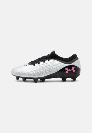 White and black soccer cleat with textured upper, black laces, black sole with studs, and pink Under Armour logo on the heel.