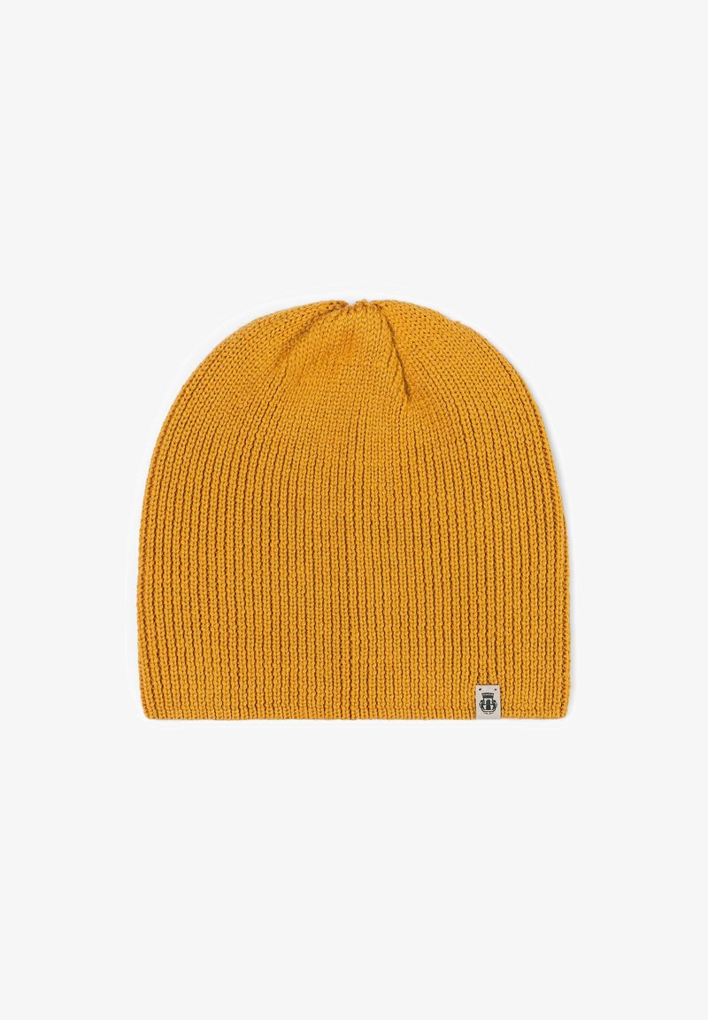 Senfgelber Strickbeanie mit einem strukturierten Rippenmuster. Verfügt über ein kleines Etikett am unteren Rand, eine domförmige Oberseite und weichen Stoff.