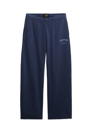 Pantalon de survêtement bleu marine avec une coupe décontractée, une taille élastique et l'inscription "BOSTON" en bleu clair sur la jambe gauche. Material en coton doux.
