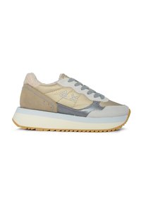 Sneakers featuring a beige and gray suede/mesh upper, gray laces, plush lining, and a thick white midsole with a textured gum outsole.