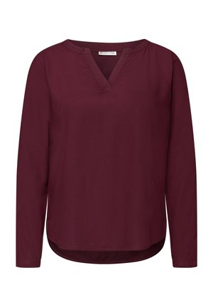 Burgundská halenka s dlouhým rukávem a véčkovým výstřihem, vyrobená z hladkého materiálu; má zaoblený lem a boční rozparky pro snadný pohyb.