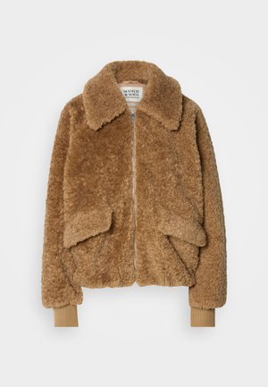 Brown faux fur bomber jacket with a zip closure, large collar, and two front pockets. Ribbed cuffs in a lighter shade.