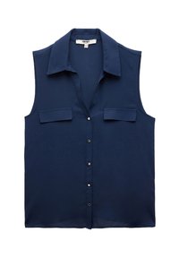 Marinblus utan ärmar i en mjuk tyg som har knäppning fram, två bröstfickor och en klassisk kragsdesign.