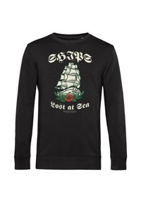 Felpa nera con collo rotondo caratterizzata da una stampa di una nave a vela, con la scritta "Perso in Mare" e accenti floreali in verde e rosso.