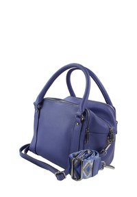 Paarse leren handtas met dubbele bovenhandvatten en een afneembare, gestructureerde schouderband. Voorzien van meerdere met rits afgesloten vakken en een gestructureerde afwerking.