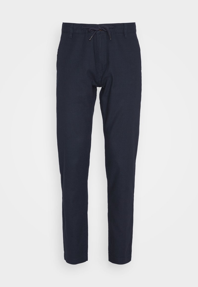 Pantalones azul marino hechos de una tela ligera, con una cinturilla ajustable y un diseño de pierna ajustada con una textura suave.