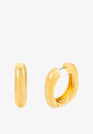 Kultaiset rengaskorvakorut, joissa on sileä, kiillotettu pinta. Korvakorut ovat pyöreät ja niissä on pieni kruunulogo pinnassa. Kaiverrettu teksti "Michael Kors".