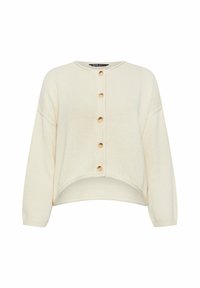 Krämmfärgad stickad cardigan med rund halsringning, sex stora knappar framtill och lätt kortare ärmar. Texturerat mönster genom hela plagget.
