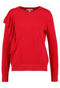 Pull rouge à manches longues avec col rond et détail à volants sur l'épaule gauche, poignets et ourlet côtelés.