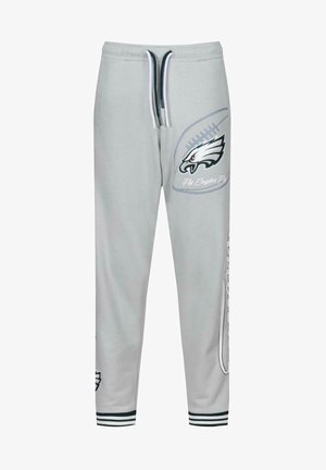 Pantaloni di cotone grigi con logo di un'aquila e testo "Fly Eagles Fly". Vita elastica con cordoncino, polsini a coste e grafica laterale.