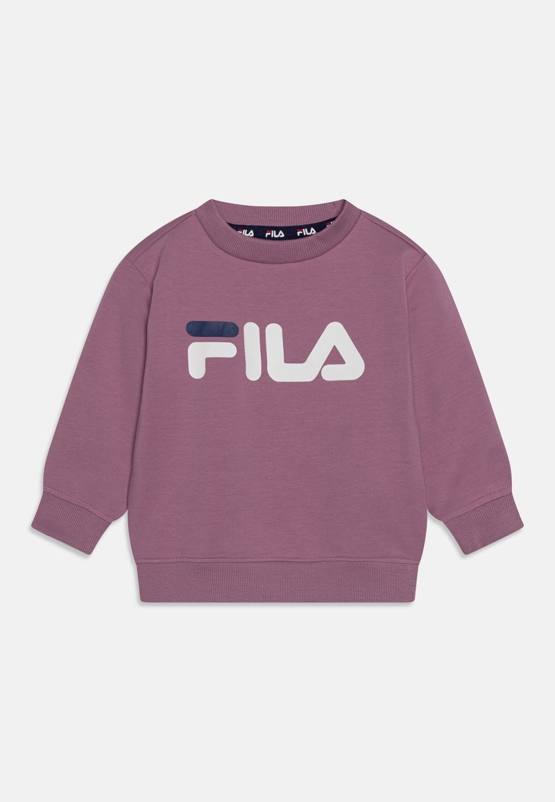 Sweatshirt rose à manches longues, encolure ronde et manches côtelées. Présente le logo blanc de Fila sur le devant, fabriqué en un mélange de coton doux.