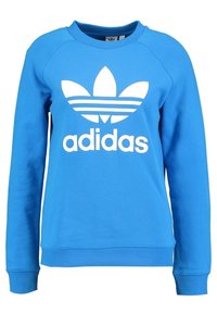 Modrá mikina z bavlněné směsi s žebrovanými manžetami a lemem. Má velké bílé logo Adidas a ikonický design se třemi pruhy na rukávech.