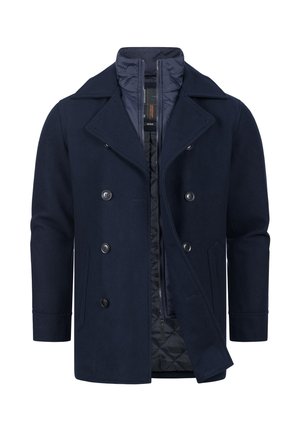 Abrigo de lana azul marino tipo peacoat con cierre de doble botonadura, botones prominentes y forro acolchado. Presenta un cuello clásico y bolsillos laterales.