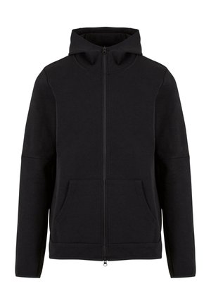 Sort zip-up hoodie lavet af blødt stof, med høj krave, to forlommer og et glat, minimalistisk design uden dekorationer.