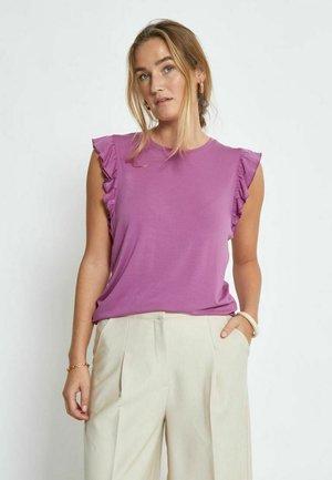 Purple short-sleeve top with ruffled shoulder accents, paired with cream-colored wide-leg trousers. Smooth fabric texture, casual design.