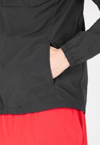 Endurance KYSON - Softshelljacka - 1001 black