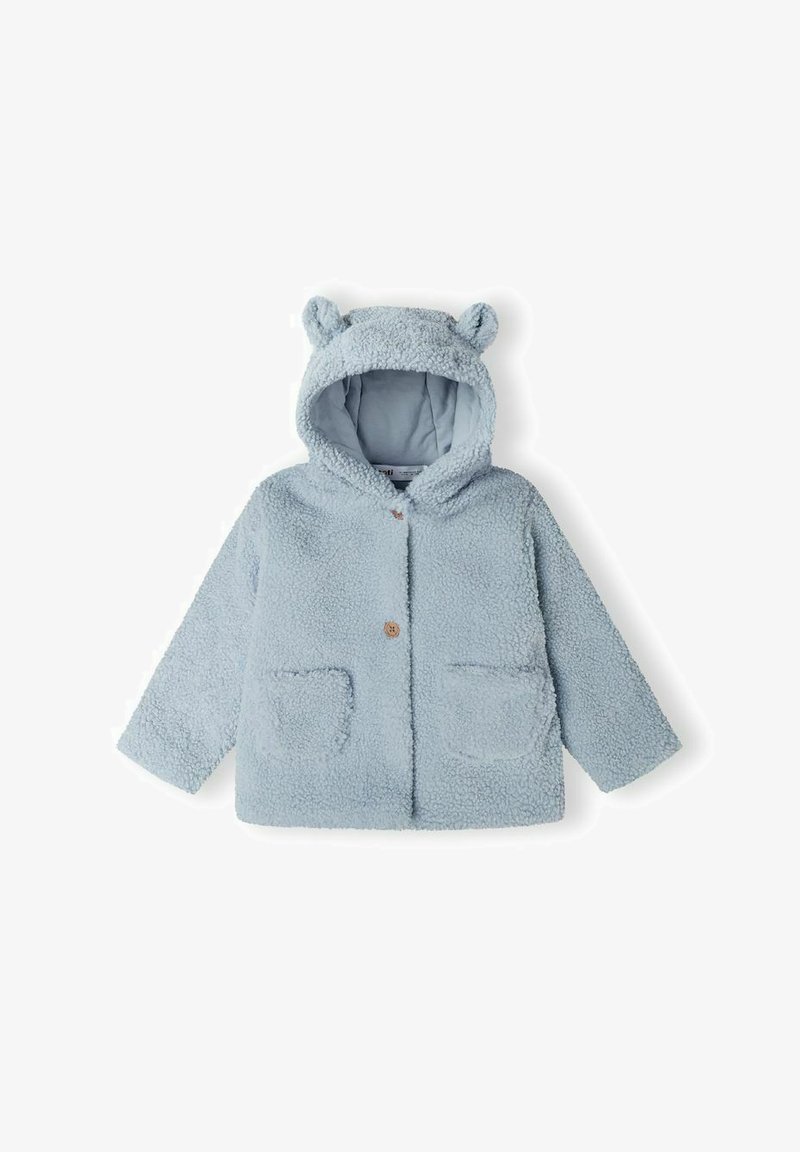 Hele sinine fliistekind, millel on kapuuts ja karu kõrvad, nööbid ning kaks eesmist taskut. Pehme tekstuur ja mugav disain.