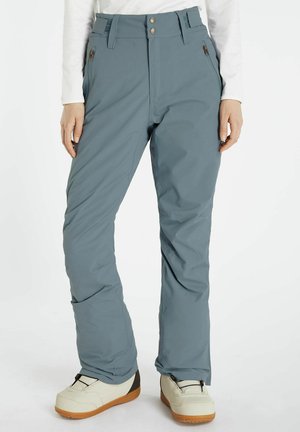 Skibroek in teal blauw, gemaakt van waterafstotend materiaal, met een hoge tailleband, zijzakken en een relaxte pasvorm voor bewegingsvrijheid.