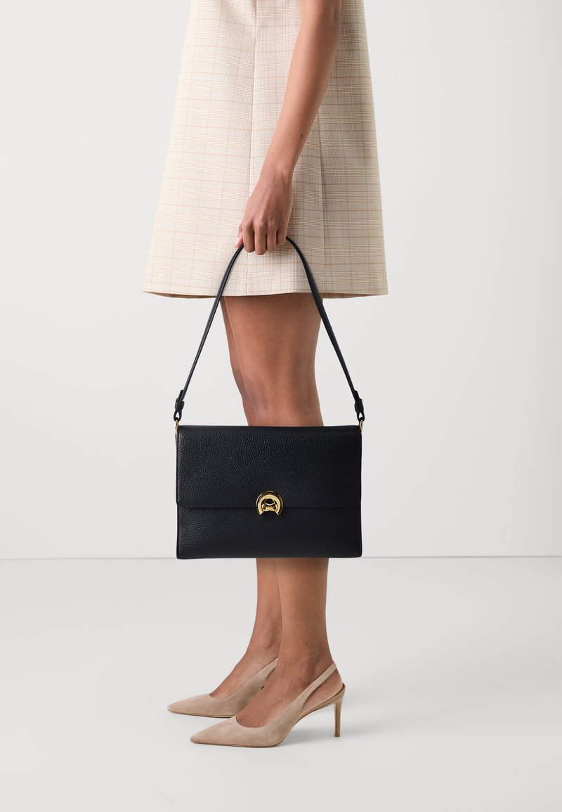 Coccinelle BINXIE - Τσάντα χειρός - noir