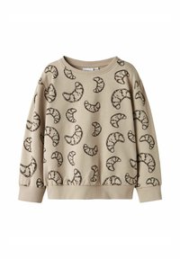Sweatshirt beige avec un motif de croissants répété en marron foncé. Col et poignets côtelés, tissu doux avec une coupe décontractée.