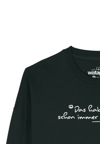 Schwarzer Rundhalsausschnitt-Sweatshirt mit teilweise sichtbarem, weißem handgeschriebenem deutschen Text, hergestellt von "watap".