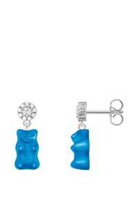 Blaue Gummibärchen-Ohrringe mit silbernem Stift, verziert mit einem runden, klaren Strassstein oben. Glatte Textur und verspieltes Design.